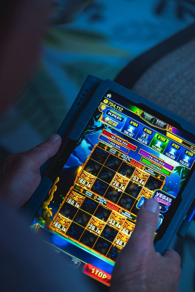 man playing mobile games